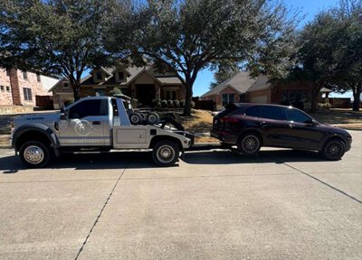 Tow truck ready to remove junk vehicle